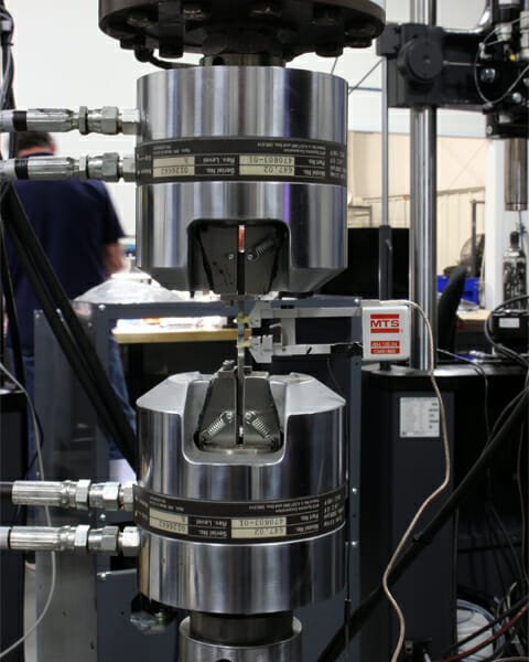 Universal Testing Machine Applying Tensile Forces to a Sample